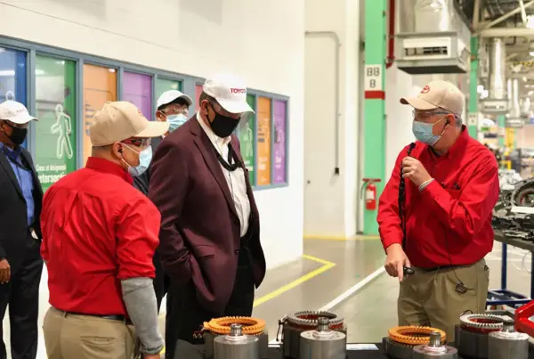 Senator Joe Manchin, center, tours the West Virginia Toyota factory, on Nov. 11, 2021